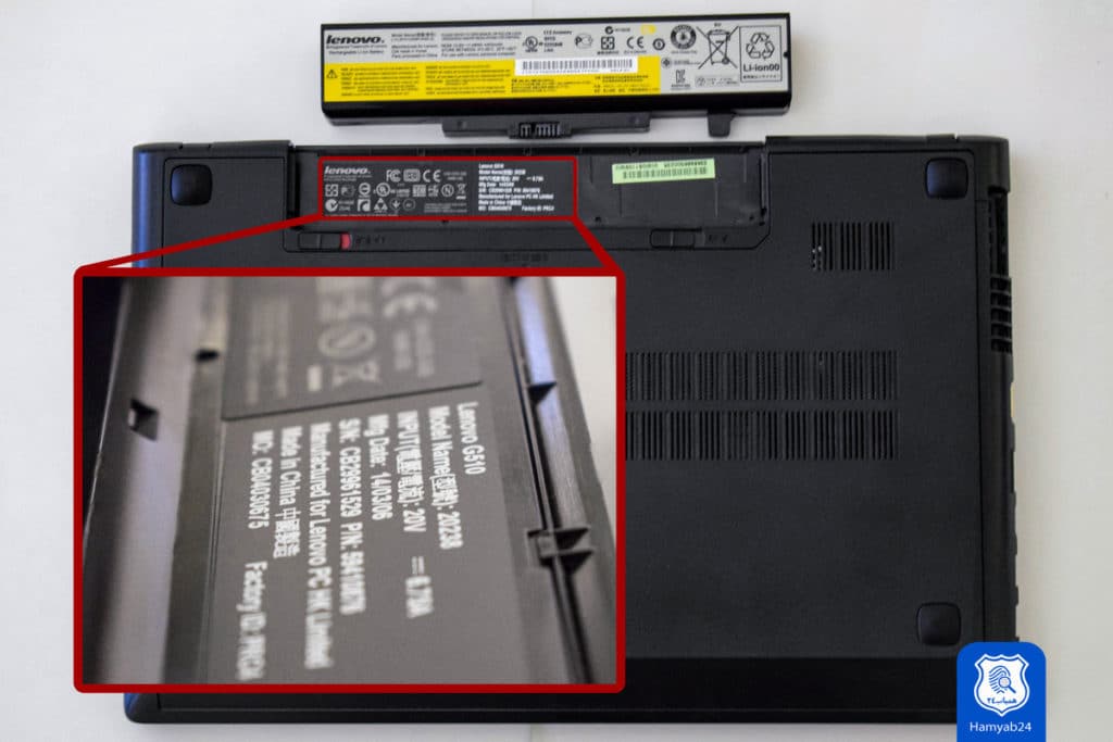 شماره سریال همراه با اطلاعات جزئی که در جایگاه باتری لپ تاپ لنوو قرار گرفته است